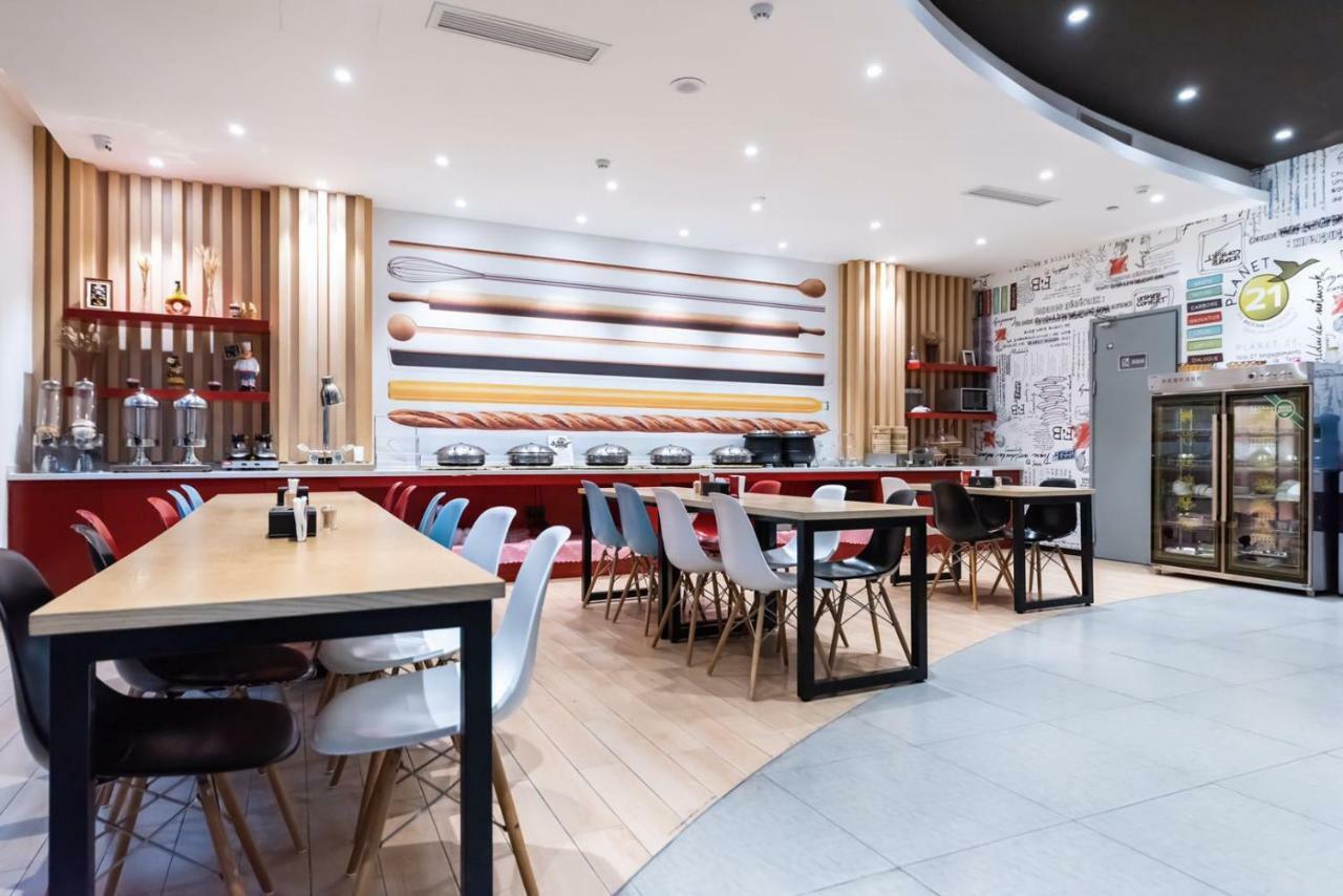 Отель Ibis Wuxi Yixing South Renmin Rd Экстерьер фото